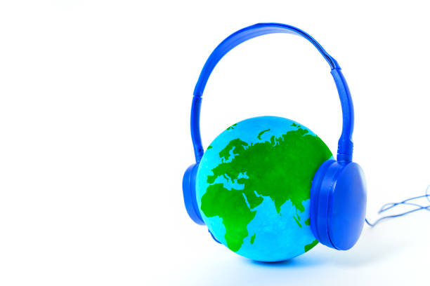istock Globe Listening to the Music Isolated on White 1704513496