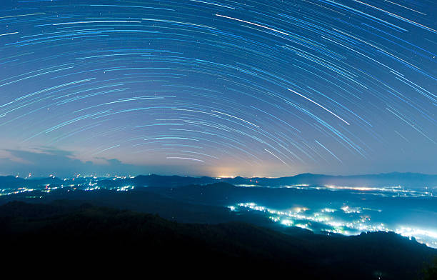 Starry Night Above Beautiful Misty Mountain Stock Photo - Download Image  Now - Long Exposure, Star Shape, Multiple Exposure - iStock