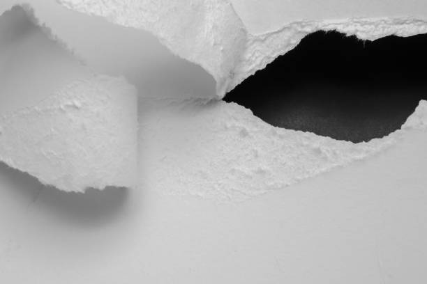 istock paper, glowing edge of paper. a background 1704541142