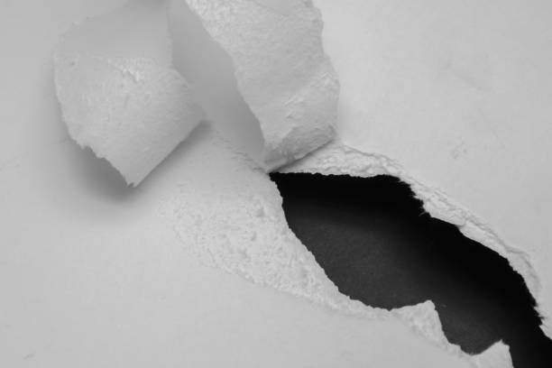 istock paper, glowing edge of paper. a background 1704549426
