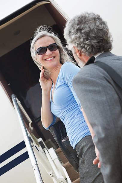 istock Classy business traveler getting onto plane 170456276