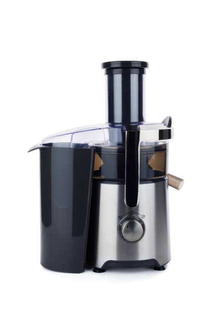 istock Electric juicer isolated on white background. Fruit and juice machine on white 1704574392