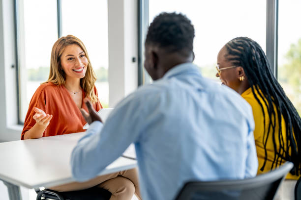 istock Multiracial colleagues having a meeting in the office 1704577807
