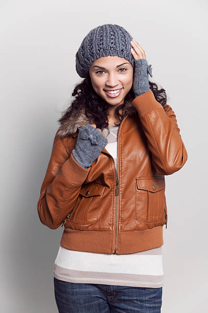 istock Ethnic woman with jacket smiling 170458163