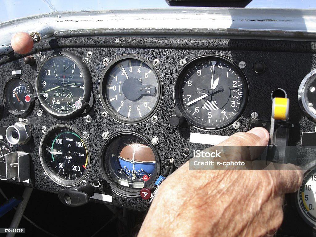 Aircraft Cabine (Click for more) Old Professional Pilot Flying An Old Plane Airplane Stock Photo