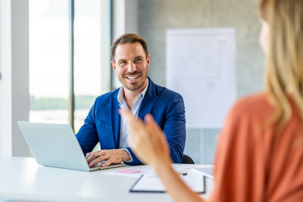 istock Man having a business meeting, recruitment or agreement. 1704590322