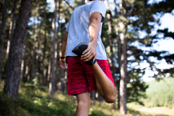 istock Man stretching his muscles before his workout outdoors. 1704595169