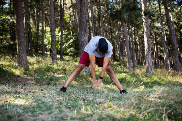 istock Man stretching his muscles before his workout outdoors. 1704596944