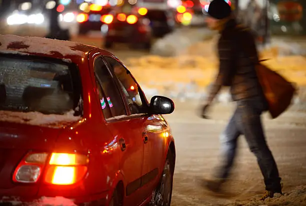 Photo of Man on winter zebra crossing