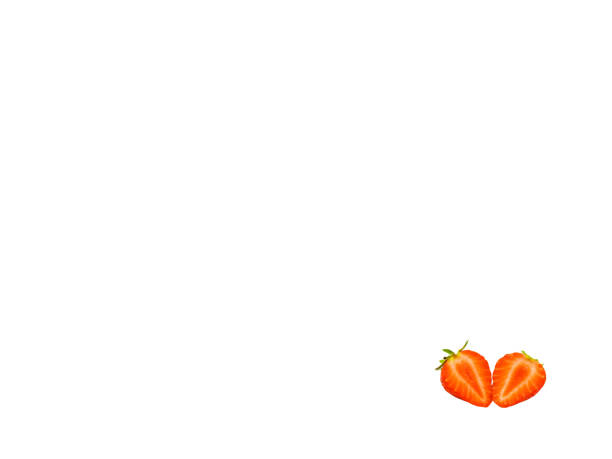 Strawberry cut in half isolated on a plain white background. Copt space.