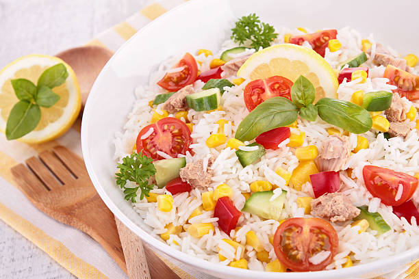 bowl of rice salad bowl of rice salad tomato rice stock pictures, royalty-free photos & images