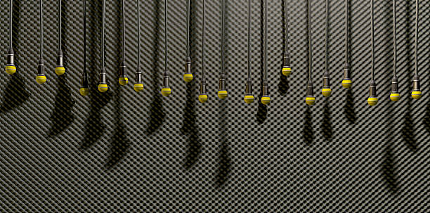 Microphones Dangling On Sound Proof Acoustic Foam