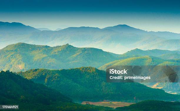 Beautiful Sunrise At Misty Morning Mountains Stock Photo - Download Image Now - Mountain, Environmental Conservation, Green Color