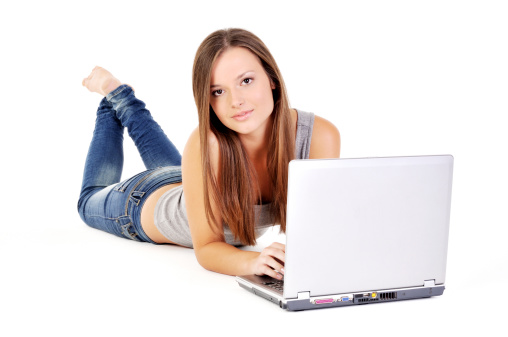 Beautiful young woman with laptop.