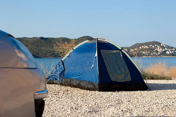 Photo of tent & automobile