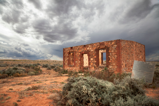 Abandoned stone house in Silverton, Australia. Silver, lead and zinc were discovered here in the 1880s and the town flourished for a short time until much larger deposits were discovered nearby at Broken Hill. Some of the buildings in Silverton have been restored whilst other are left to the weather.