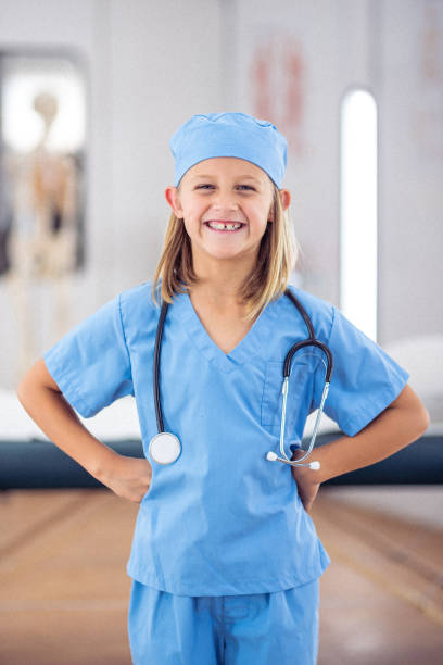 istock Young girl dressed as a surgeon 1704711878