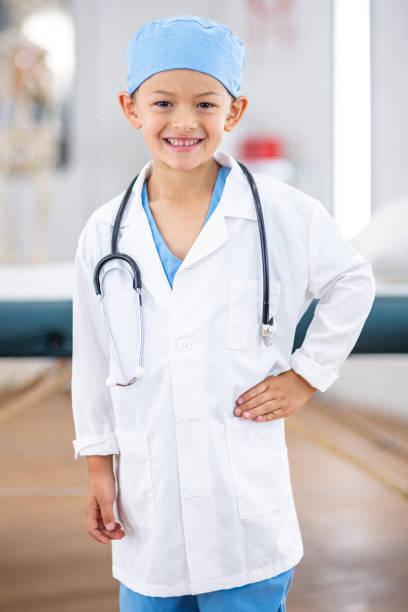 istock Happy boy pretending to be a doctor 1704712094