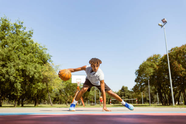 istock Young black basketball player 1704751163