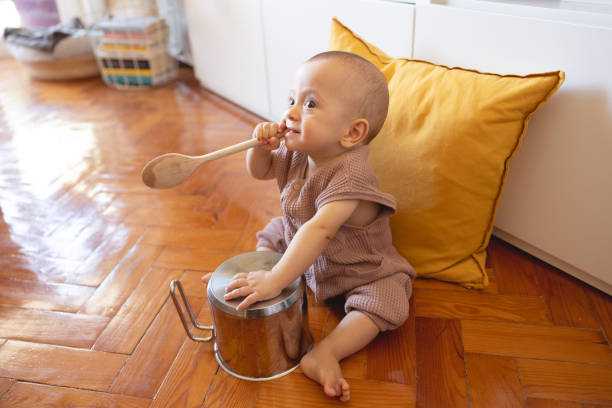 istock 8 month old baby boy playing 1704765279