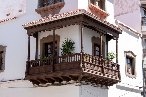 Arrecife de Lanzarote, Las Palmas, Canary Islands - April 24, 2023: Traditional hand-carved Canarian balcony on a house in Arrecife de Lanzarote, Canary Islands, Spain