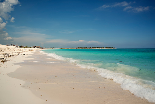 Idyllic coastline beach at Cayo Largo, Cuba. No people. Water is turquoise and sand is white and very fine. Horizontal outdoors view with copy space. This was taken in Cayo Largo, Cuba.