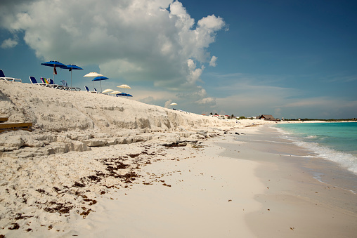 Idyllic coastline beach at Cayo Largo, Cuba. No people. Water is turquoise and sand is white and very fine. Horizontal outdoors view with copy space. This was taken in Cayo Largo, Cuba.