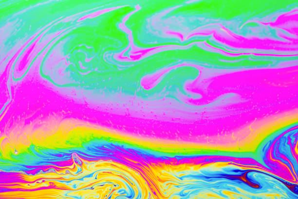 istock Psychedelic multicolored background abstract. Rainbow colors. patterns background. Photo macro shot of soap bubbles 1704826174