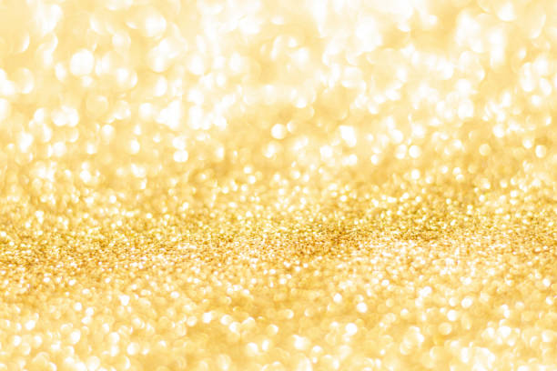 istock Gold glitter defocused texture background. gold christmas abstract background 1704828438