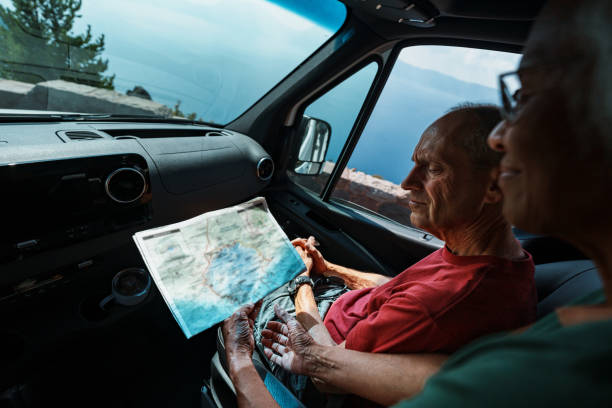 istock Retired couple on road trip deciding where to go next 1704843547