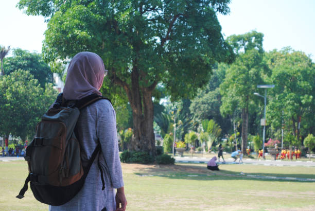 istock Backpacker makes small trip around the city. 1704935956