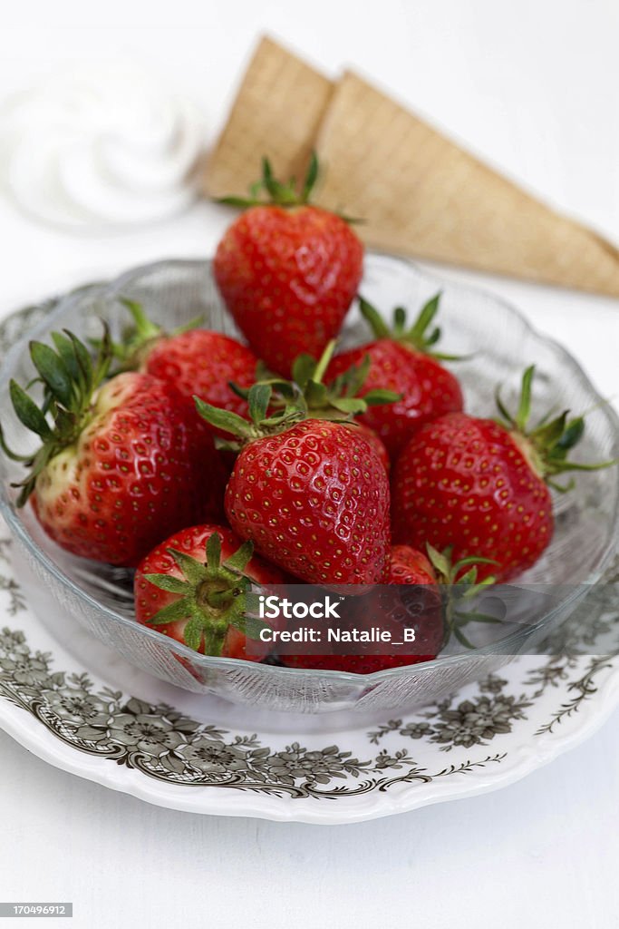 Strawberries Fresh organic strawberries and ice cream cones Berry Fruit Stock Photo