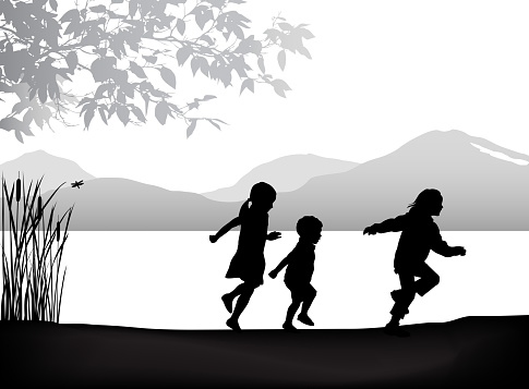 Three kids running along the lake in this silhouette vector illustration