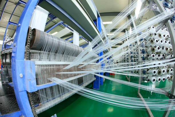 istock The production workshop of woven belt, A factory workshop where textile belts are produced 1705007760