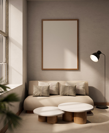 Interior design of a modern Scandinavian living room with a comfortable sofa, a minimal coffee table, a floor lamp, and a blank frame mockup on a white wall. 3d render, 3d illustration