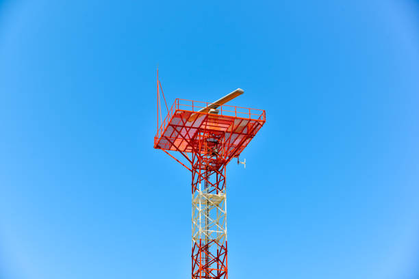 signal transmitting military antenna with tower with blue cloudy sky. - sea safety antenna radar imagens e fotografias de stock