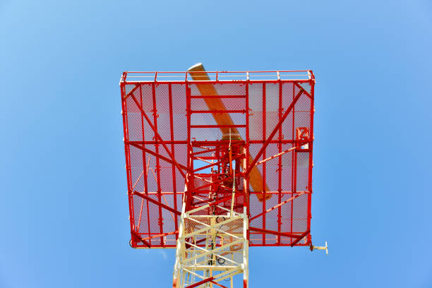 signal transmitting military antenna with tower with blue cloudy sky. - sea safety antenna radar imagens e fotografias de stock