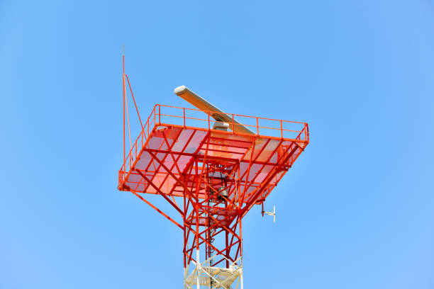 signal transmitting military antenna with tower with blue cloudy sky. - sea safety antenna radar imagens e fotografias de stock