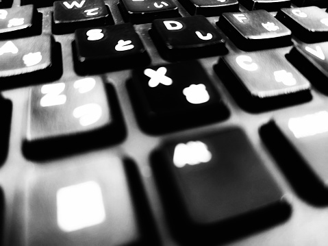 close up view of black and white keyboard keys for background