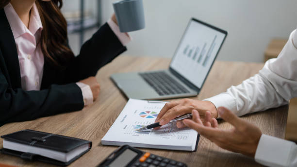istock Businessman explaining financial document to brainstorming about new startup project with executive 1705182107