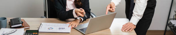 istock Business executive reading financial data and brainstorming about new startup project together 1705182110