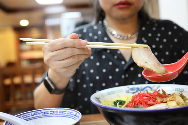 istock Eating Japanese Food 1705217379
