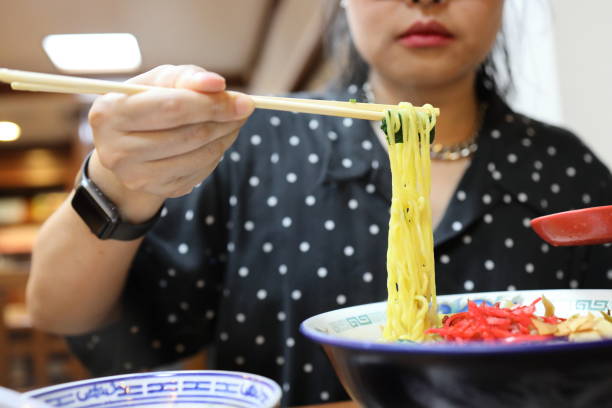istock Eating Japanese Food 1705217380