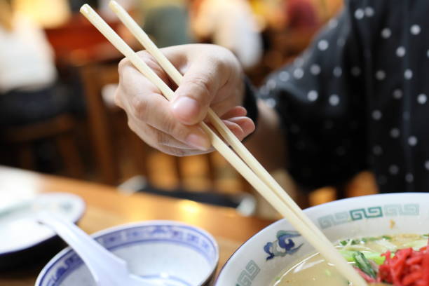 istock Eating Japanese Food 1705217385