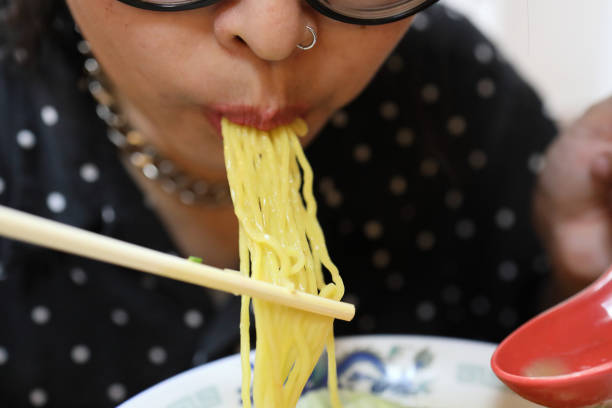 istock Eating Japanese Food 1705217387