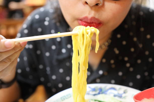 istock Eating Japanese Food 1705217391