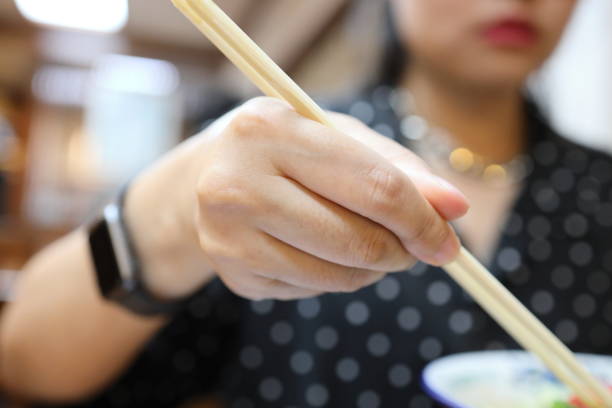istock Eating Japanese Food 1705217398