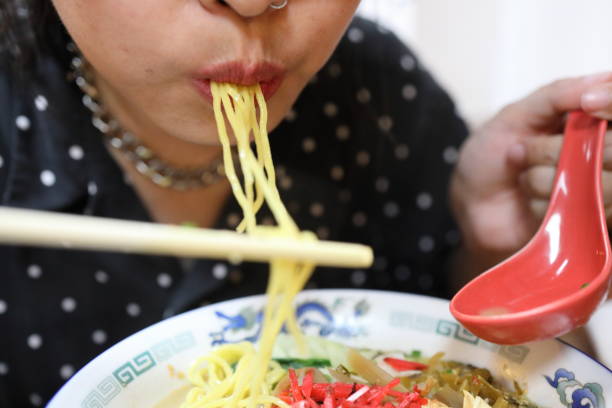 istock Eating Japanese Food 1705217401