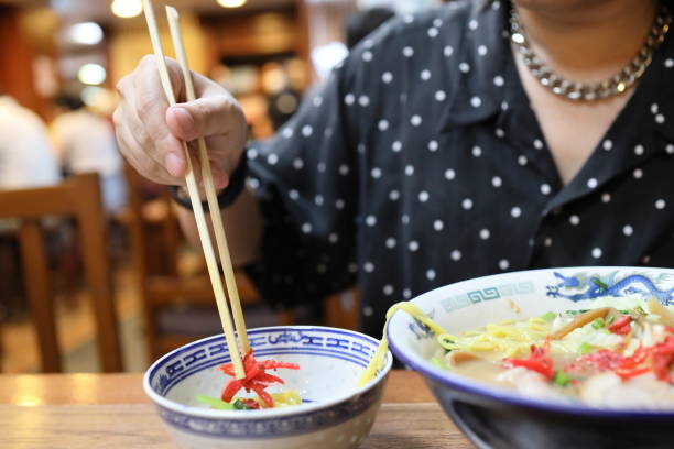 istock Eating Japanese Food 1705217403