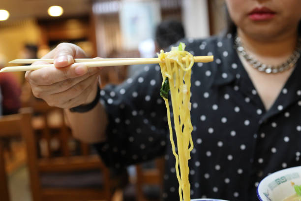 istock Eating Japanese Food 1705217405